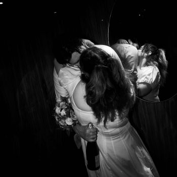Engaged couple kissing